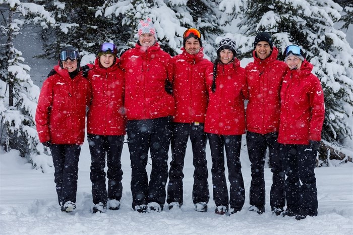Kevin Hill (centre) and Tess Critchlow (third from right) are two Central Okanagan residents competing at the Winter Olympics in Bejing, China.