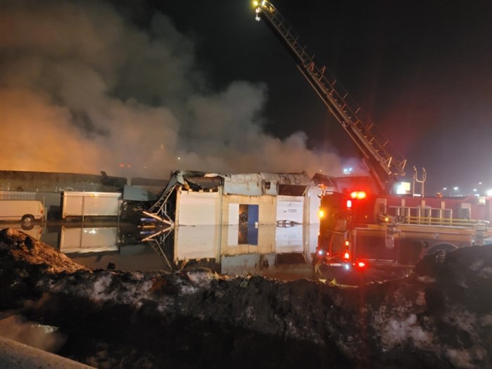 Fire destroyed several businesses on Highway 97 North in Kelowna, Tuesday, Feb. 15, 2022.