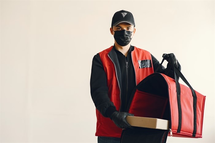 A stock photo of a delivery worker.