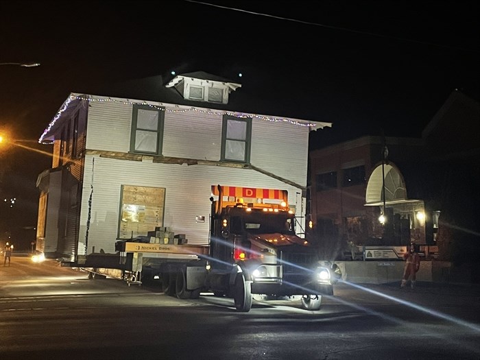 This Edwardian foursquare-style house, was moved only a few blocks from 435 Battle Street in the early morning, Saturday, March 5, to its new home on St. Paul Street.