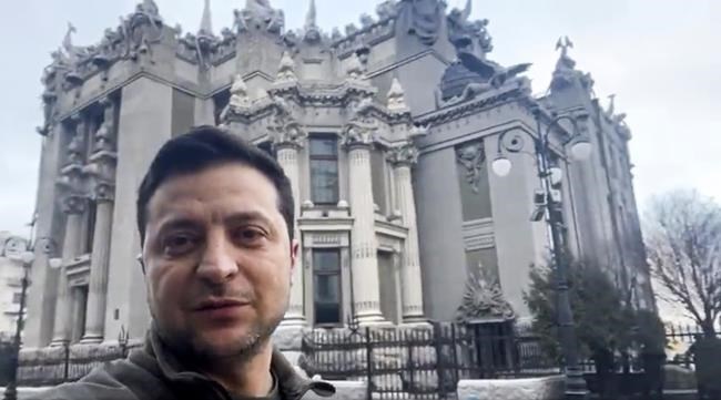 FILE - In this photo provided by the Ukrainian Presidential Press Office, Ukrainian President Volodymyr Zelenskyy speaks to the nation via his phone in the center of Kyiv, Ukraine, Feb. 26, 2022.
