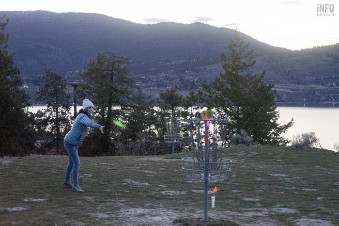 When disc golfers like Christine Tevlin come within a few meters of the basket, it is then considered putting. 