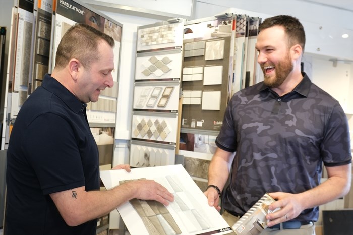 Chris Stables and Luc Jacobson discuss tile at Kelowna Floors.