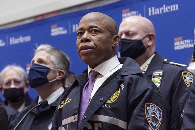FILE — New York Mayor Eric Adams speaks during the press conference at Harlem Hospital after the shooting of a New York City Police Department officer, in Harlem, Friday, Jan. 21, 2022, in New York.
