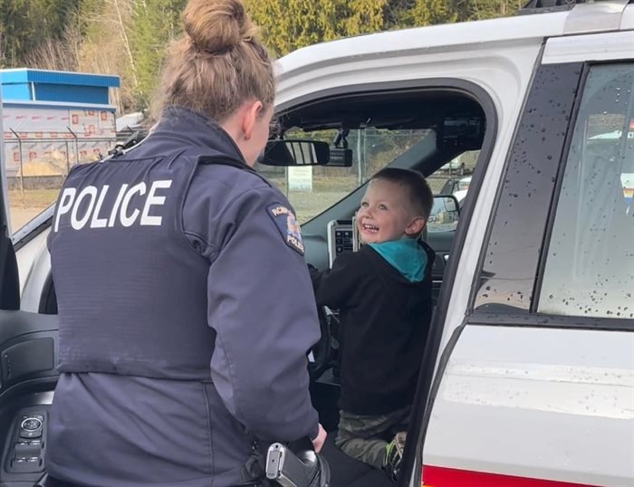 A Revelstoke RCMP officer let young Taven Knapp press all the buttons in her cruiser, April 19, 2022.