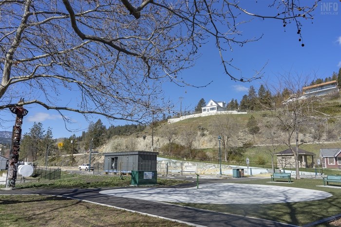 The greyish-green washrooms had to be built in order for Peachland's new splash pad to be legal, despite how the existing beige washrooms are located a few metres away. 