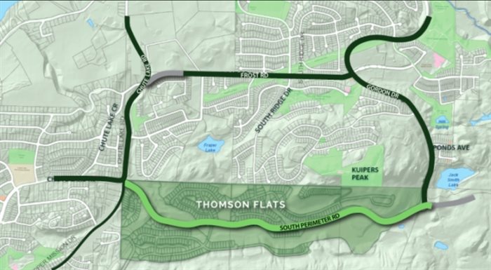 The darker green area shows Thomson Flats, complete with the proposed building lots.. The two parcels for sale are, roughly, the right half of the site.