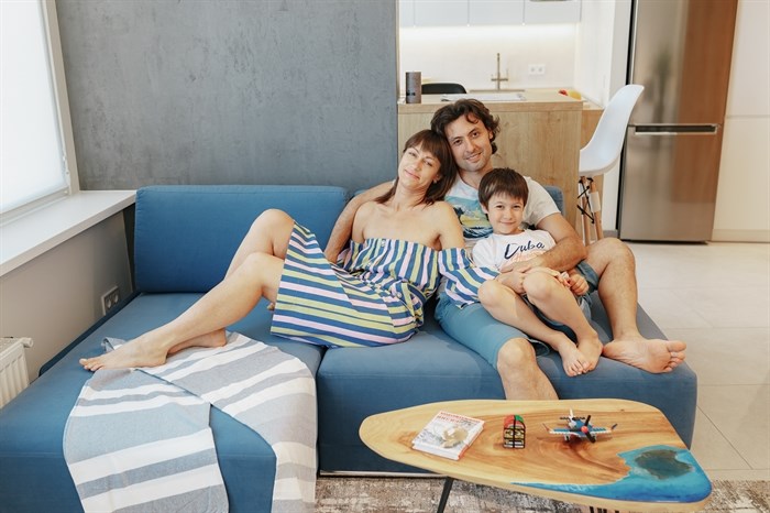 Happy days: The family at home in their condo in Odesa, Ukraine.