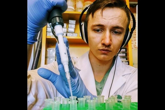 Jinx Pollard-Flamand in the lab doing what he does best — science.