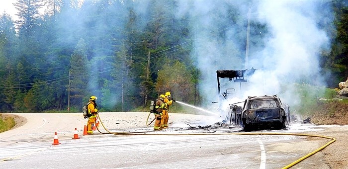 Firefighters battle a motorhome blaze on Highway 3 east of Osoyoos, May 29, 2022.