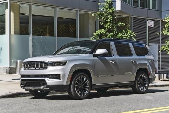 This photo provided by Stellantis shows the 2022 Jeep Grand Wagoneer. It is a large SUV that is the more luxurious version of the similarly sized and named Jeep Wagoneer.