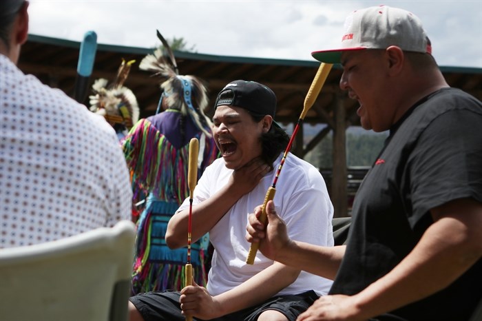 Cree Confederation drummers perform a drum song during the Grand Entry Powwow hosted at the Okanagan Indian Band’s grand reopening of its Cultural Arbor on May 28. 