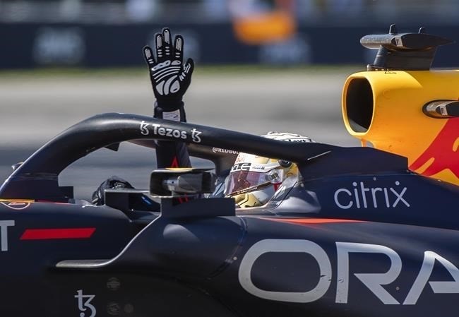 Red Bull driver Max Verstappen of the Netherlands waves to the crowd after winning the Canadian Grand Prix F1 race in Montreal, Sunday, June 19, 2022. 