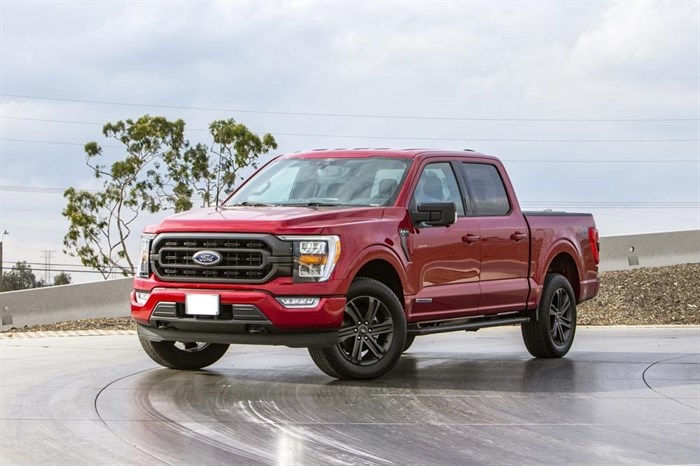 This photo provided by Ford shows the 2022 Ford F-150 with the PowerBoost hybrid engine. It gets an EPA-estimated 23-25 mpg in combined driving.