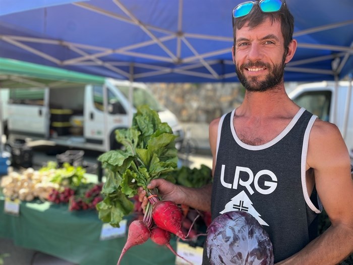 Steve Van Hassel, with Ikigai, holds some of his fresh produce available at the Kamloops Farmers' Market.