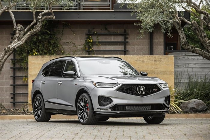 This photo provided by Honda shows the 2022 Acura MDX. It's a midsize luxury SUV with a starting price of about $49,000.