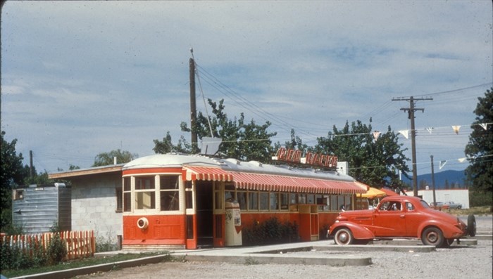 The Red Racer was a restaurant operating out of an old streetcar in Penticton during the 1950s. This photo was taken in 1955.