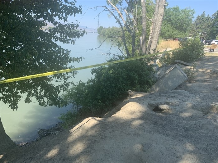 A section of McArthur Island Park has been taped off.