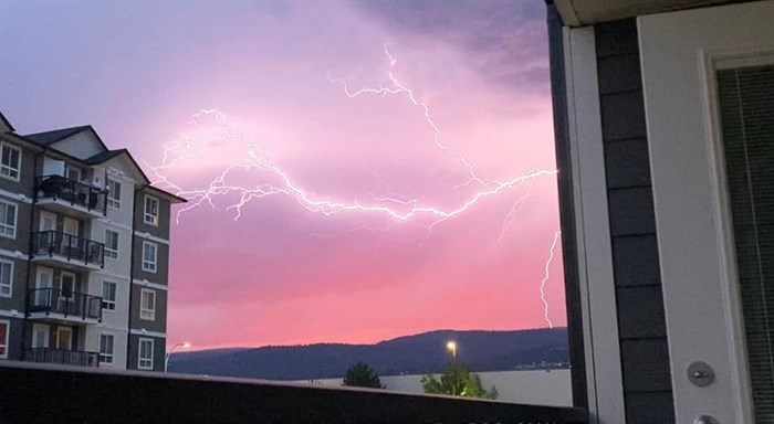Lightning and a sunset in Kelowna, Aug. 11, 2022.