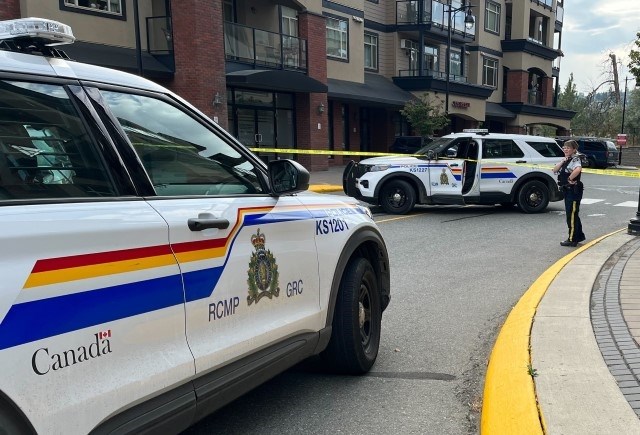 Police cordoned off most of the access to a condo complex across from Thompson Rivers University in Kamloops after a shooting, Friday, Sept. 16, 2022.