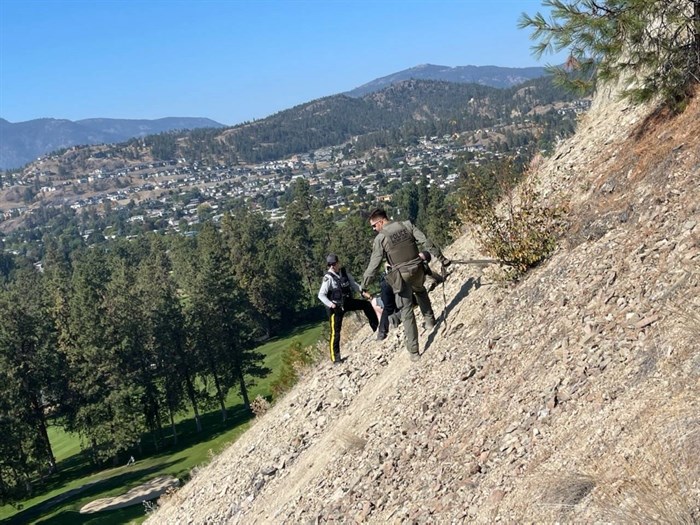 Kelowna RCMP officers rescue woman on Dilworth Mountain, Tuesday, Sept. 28, 2022.