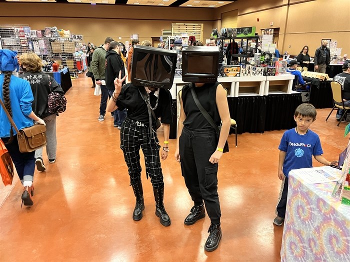 These girls are not portraying any iconic characters – they just wanted to wear televisions over their heads. 