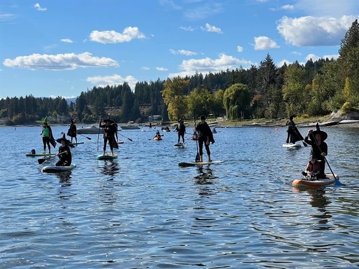 Paddle Boarders in Witch Costumes Welcome Halloween - The New York Times