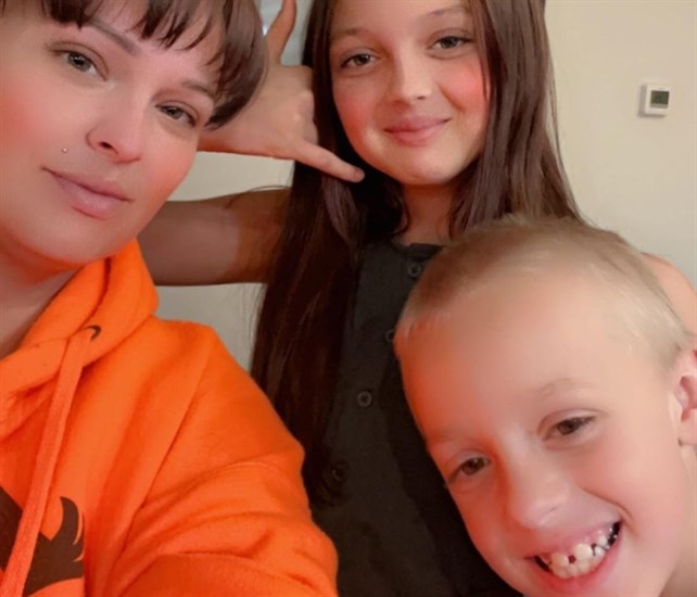 Penticton mother Kandace Sztepanacz with her kids in their small apartment. 