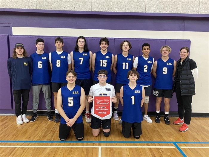 St. Ann's Academy senior boys 'A' volleyball team in Kamloops with coaches Shannon Litke & Aaron Watson.