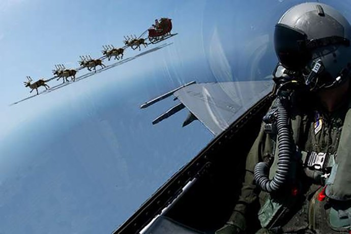 A NORAD pilot tries to keep up with Santa and his reindeer.