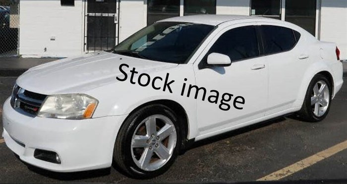 Jakob Gibbon's car is a 2012 white four-door Dodge Avenger with B.C. license plate JM9 04E, similar to this stock image.