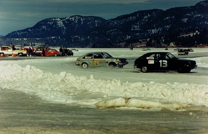 Rick Hammerl’s #13 in front of Darren Turner in #34. Warm temperatures softened the ice and studded tires are creating a layer of slush on the track that got deeper with each passing lap.
