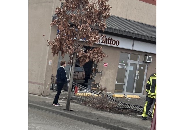 An SUV rammed the storefront of Blue Orchid Tattoo on Sunday afternoon, Jan. 15, 2023.