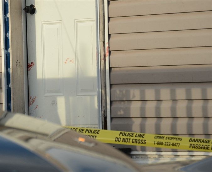Blood stains can be seen on the trailer door.