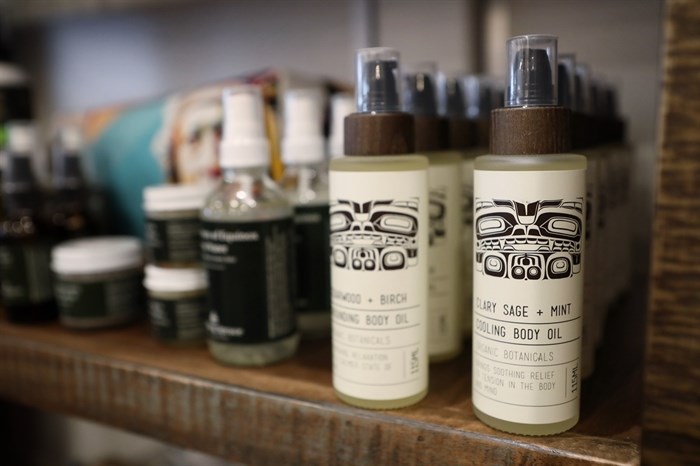 Body oils and other self-care products line the shelf at Fireweeds Boutique. 
