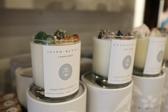 A variety of candles by Crowfoot Collective are sold at Fireweeds Boutique.