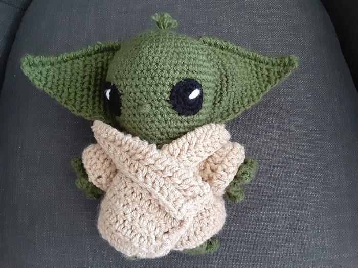 Crocheted Yoda finger puppet. 
