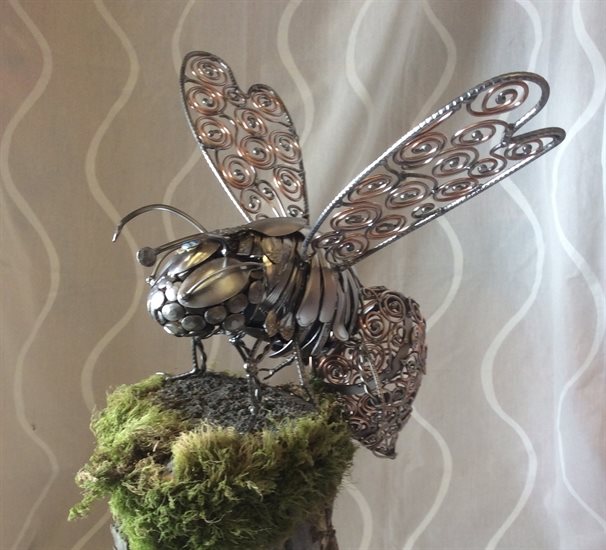 Bee sculpture by Osprey Lake metal artist Mark Wong. 