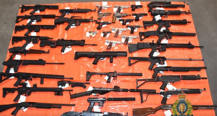 Dozens of guns were found during the raid.