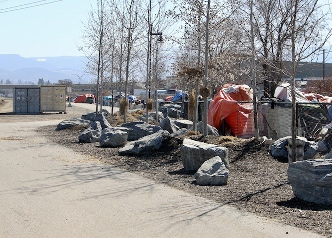 The growing number of homeless in Kelowna has led to a major expansion of the city's outdoor sheltering site next to the Okanagan Rail Trail.