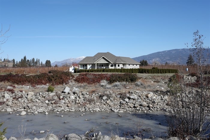 A property near the banks of nlux?lux??cwix (Trout Creek) in the District of Summerland in syilx homelands on March 22, 2023.