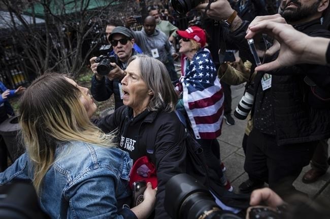 Protesters argue at the Collect Pond Park across the street from the Manhattan District Attorney's office in New York on Tuesday, April 4, 2023.