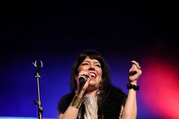 ShoShona Kish of Indigenous musical group Digging Roots performs at the 2023 sk?l?ap Movable Feast show in snpintktn (Penticton) in syilx homelands on March 29, 2023.
