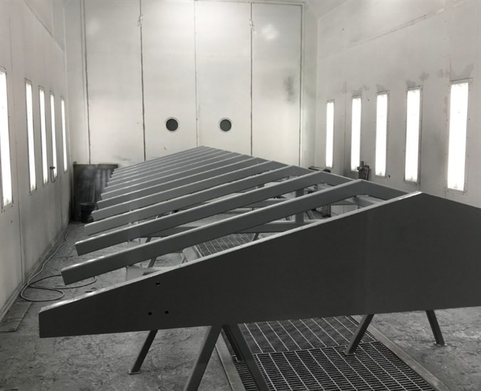 Saber Coatings completed roof frame in paint booth