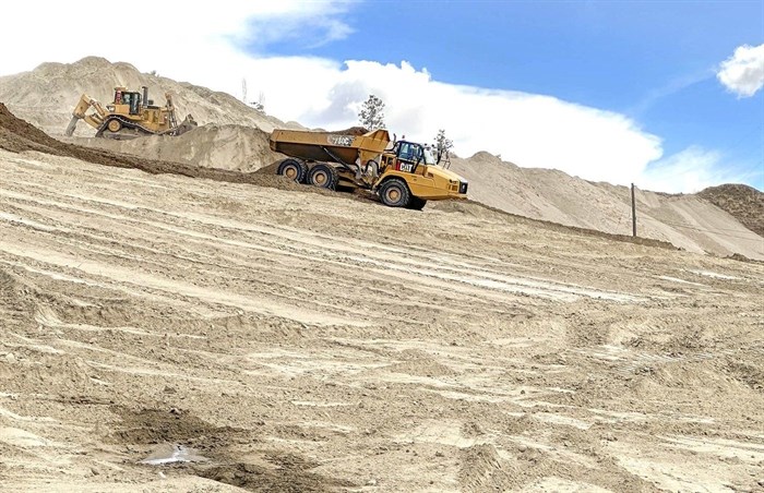 Heavy equipment works to clear the former Matheson Creek Farm land in Okanagan Falls that will soon be a winery.