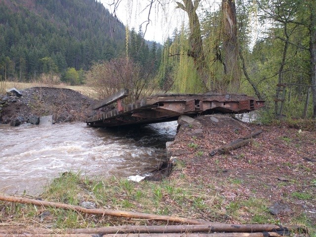 Fallen bridge at 8440 Douglas Lake Road, Westwold. 