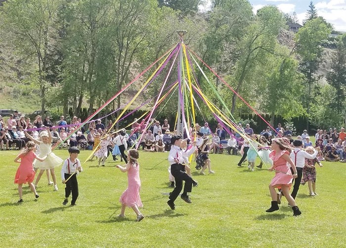 Dance around the May Pole at the 2019 festival.
