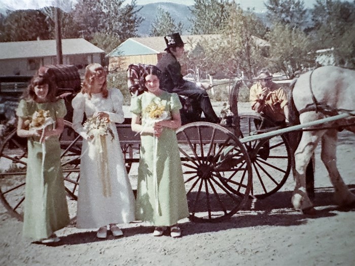 Members of the 1970 Naramata May Day royalty, left to right, princess Deb Osborne, queen Wanda Pye and princess Cathy Rickett. Their Naramata Elementary classmate Geoff Gawne is in the driver's seat.