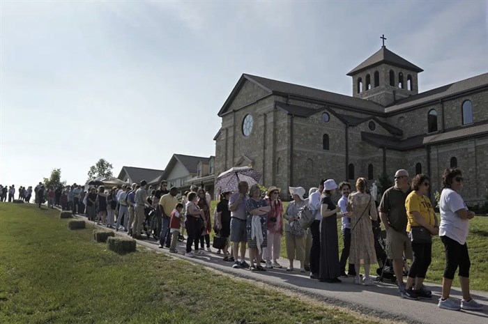 People wait to view the body of Sister Wilhelmina Lancaster at the Benedictines of Mary, Queen of Apostles abbey Sunday, May 28, 2023, near Gower, Mo.