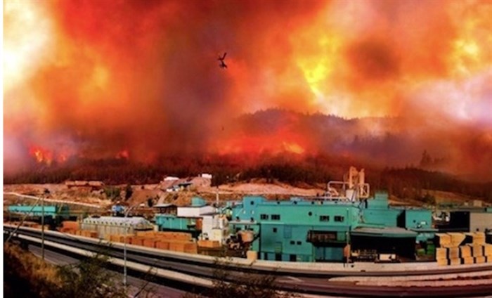 Gorman Brothers Lumber Mill threatened by flames during the 2009 Glenrosa Wildfire.
